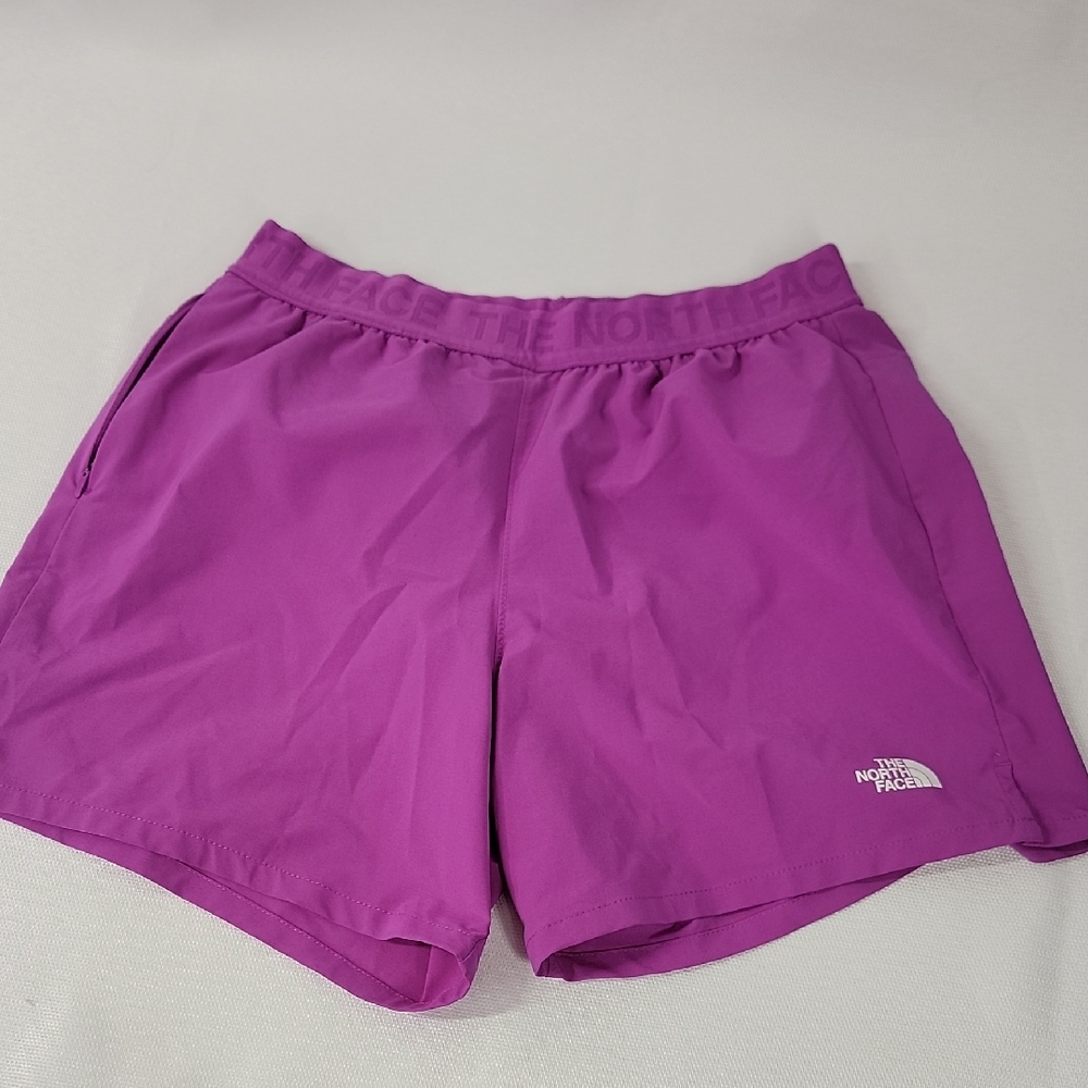 The North Face Women's Vibrant Purple Athletic Shorts.